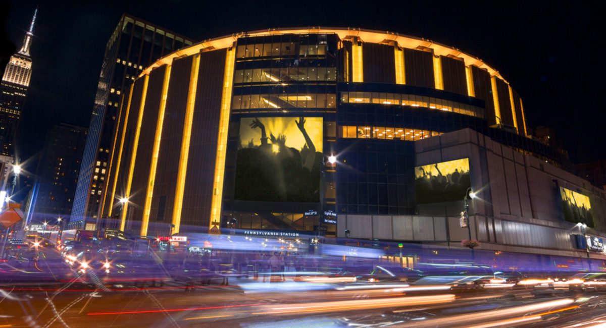 The Madison Square Garden shines at night.